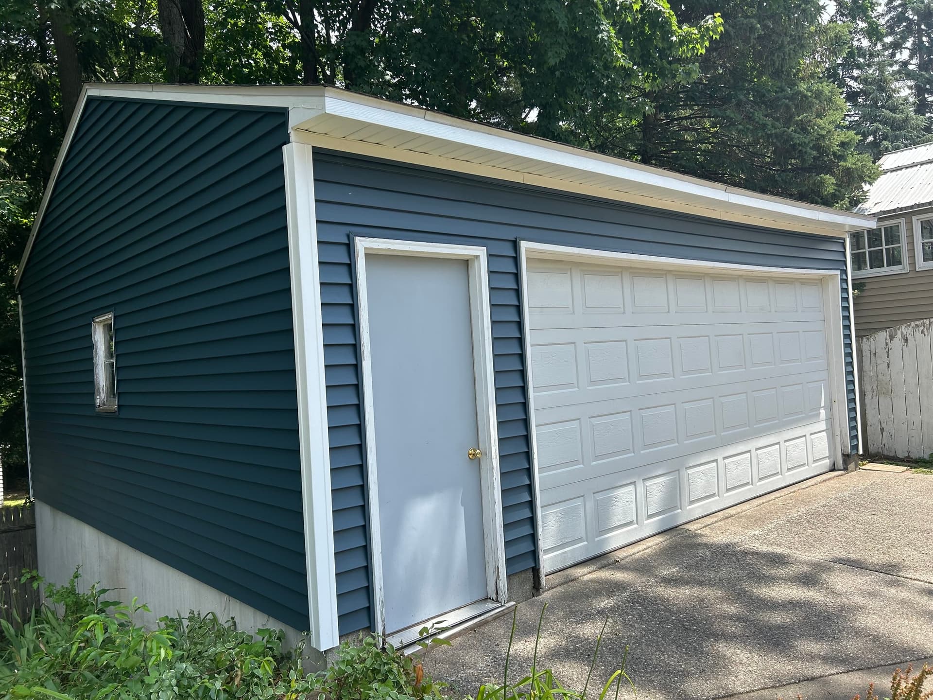 Detached garage — siding June 2024