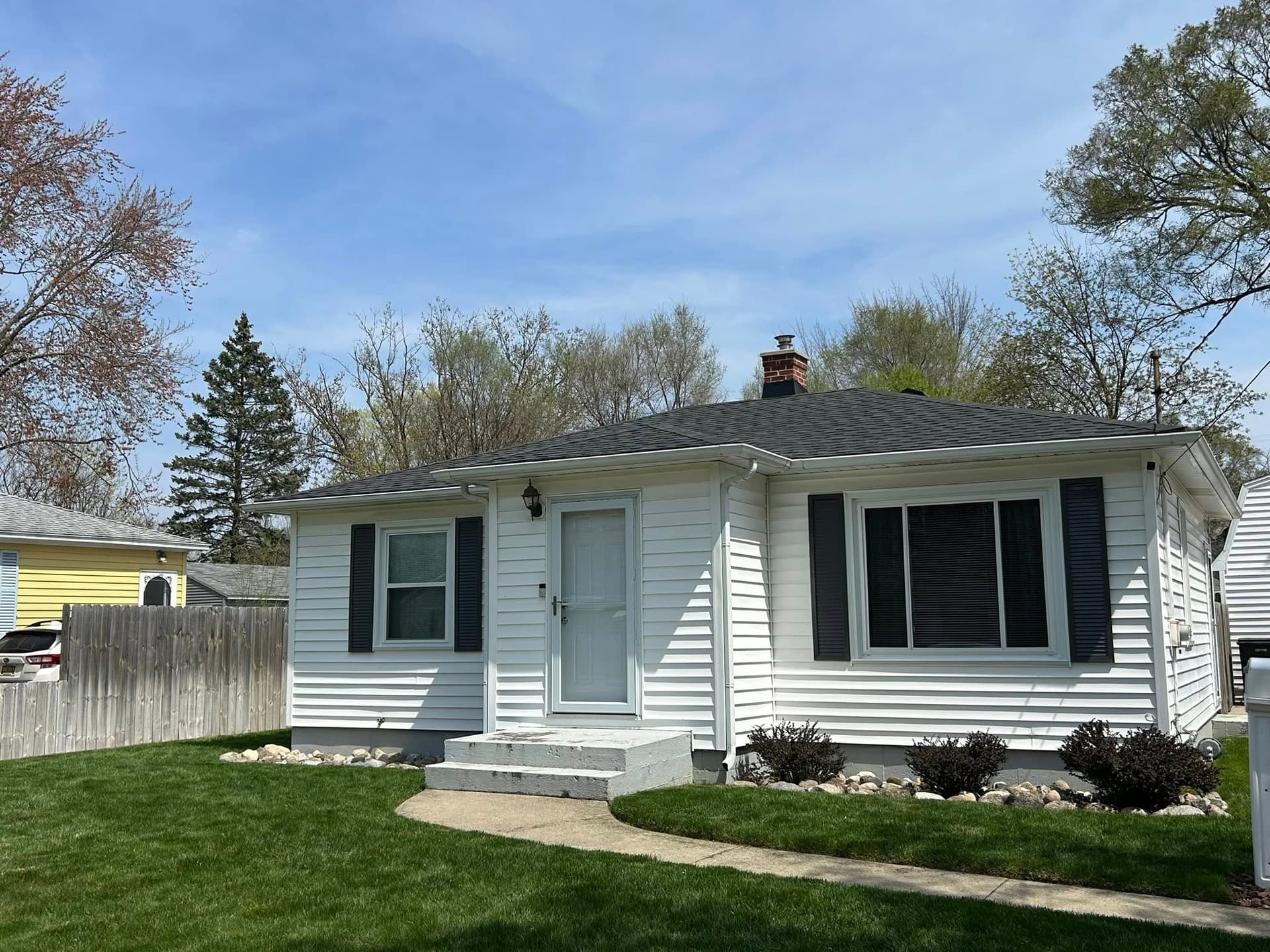 New gutters protecting home foundation