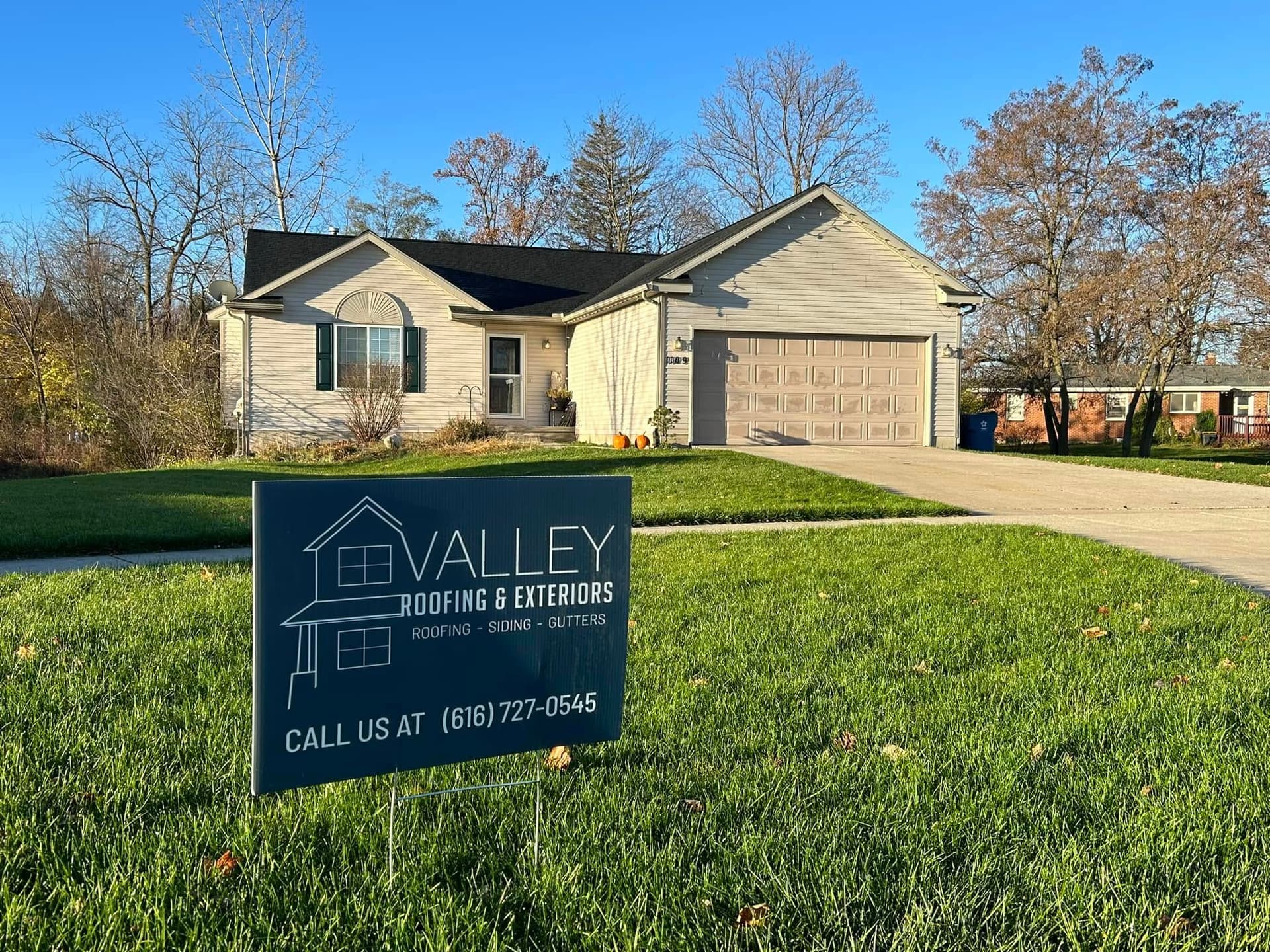 Beautiful home exterior with new roofing by Valley Roofing