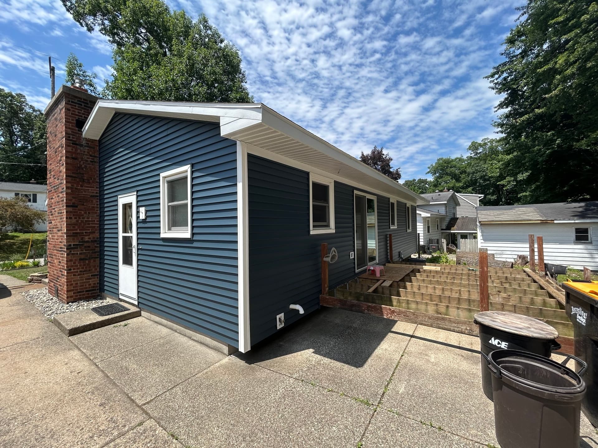 Home exterior with fresh siding installation
